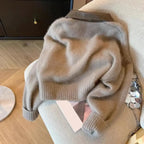 Pull “Soraya” - Cardigan zippé en maille douce à col cuir vintage Neyvora